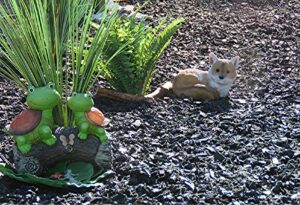 smiling turtles and small fox figurines with ferns