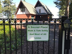A Sacred Place Sign at Gate.